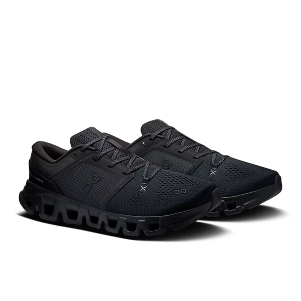 A pair of black On Cloudrunner sneakers shown from a three-quarters angle against a clean white background.
