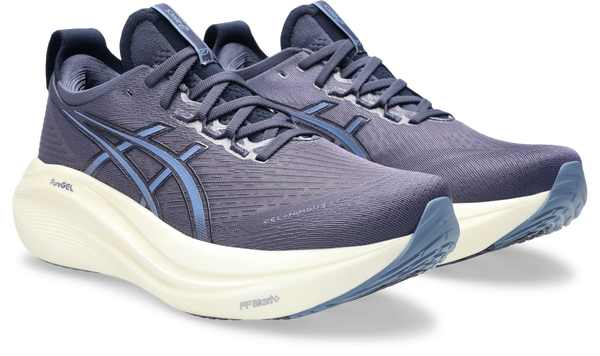 A lighter blue Asics logo is in the middle of the upper on both sides.