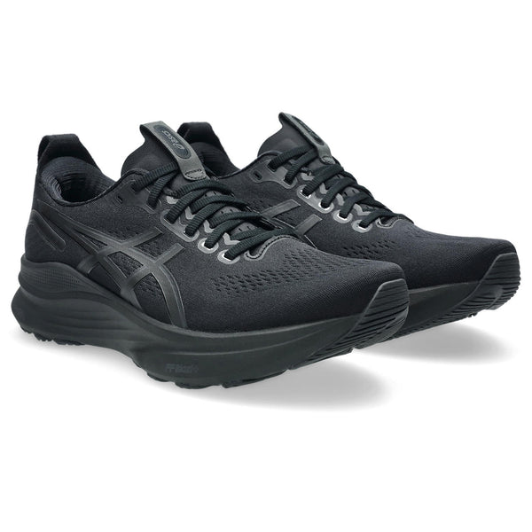 Black running shoes on a white background