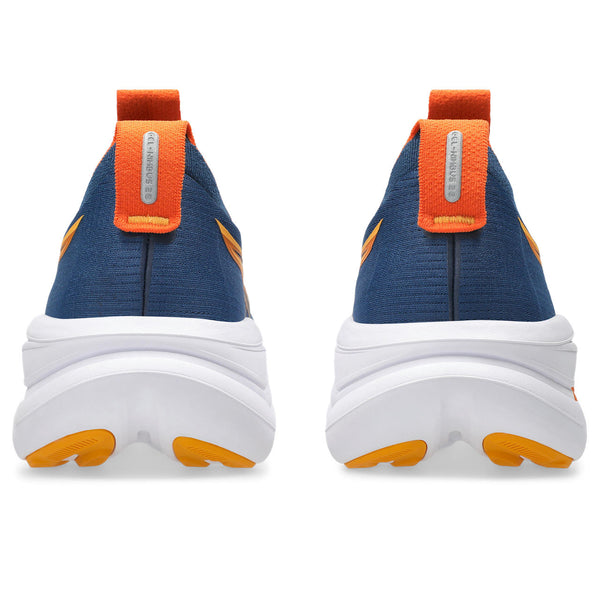 Blue and orange shoes with white soles on a white background