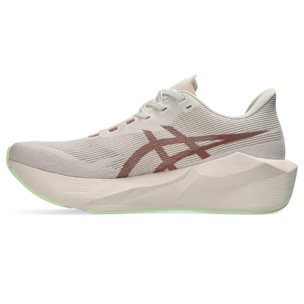 Off w and beige running shoe with brown accents on a white background