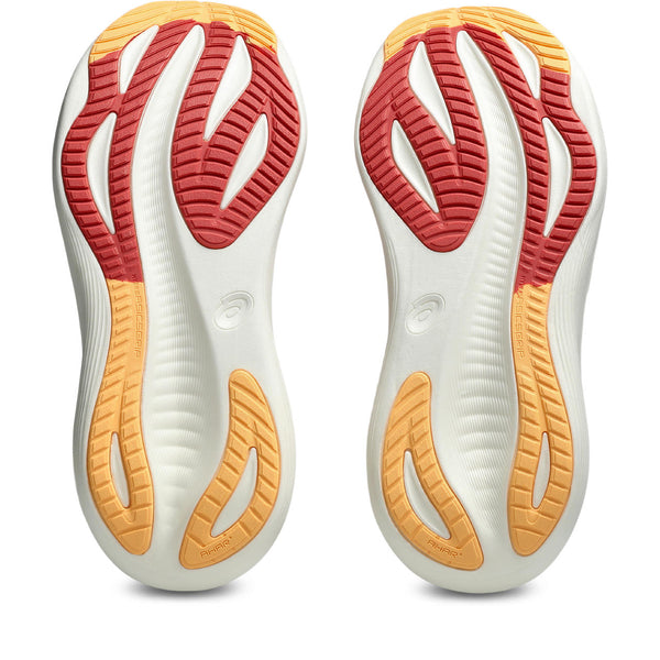 Close-up of a pair of Nimbus 27 running shoes with red and orange sole pattern on a white background