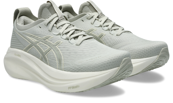 The upper of this shoe is a greenish grey and the midsole is white.