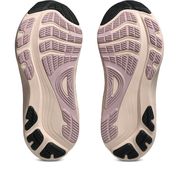 Close-up of the sole of a shoe with a textured pattern on a white background