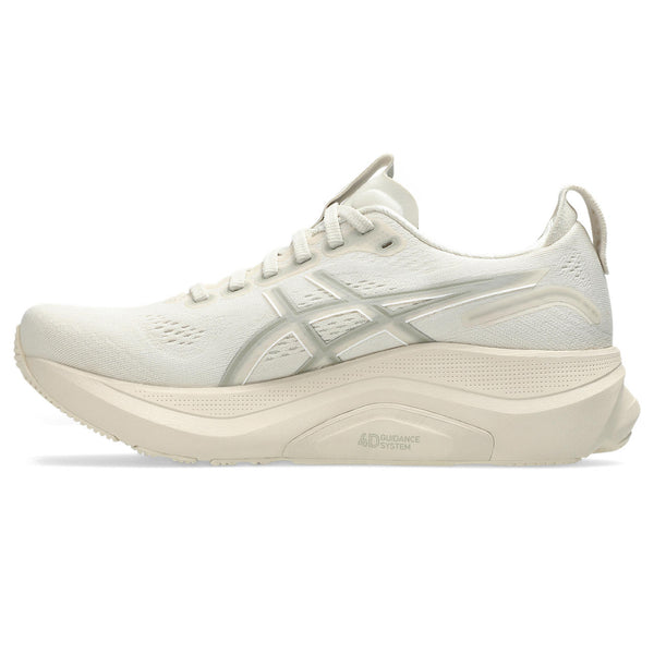 Medial side of a lightly colored ASICS running shoe with brand logo on a white background.