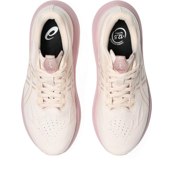 Light pink laces are used to match the upper.