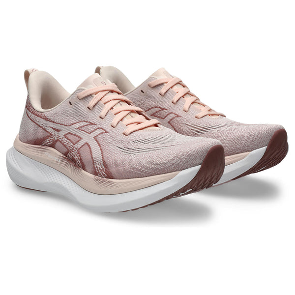 A pink Asics logo is in the middle of the upper on both sides.
