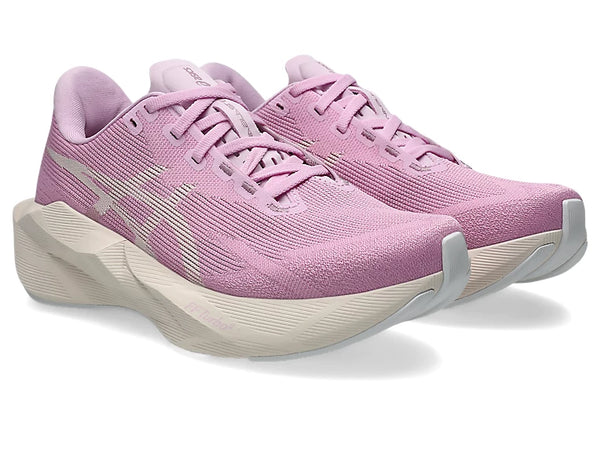 Lilac purple running shoe on a white background