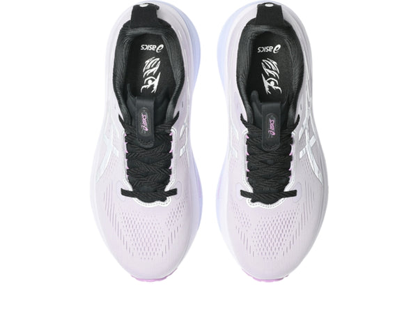 Purple and black running shoe on a white background