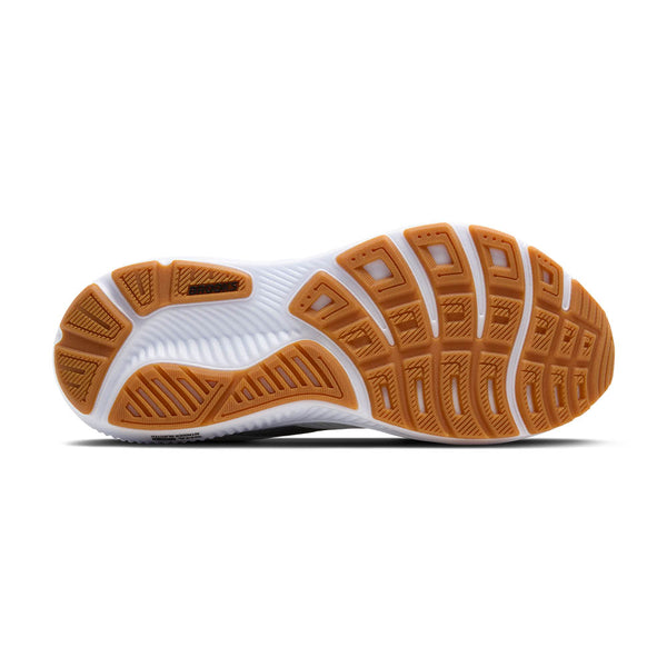 Gum rubber is used on the outsole of the shoe which stands out against the white midsole.