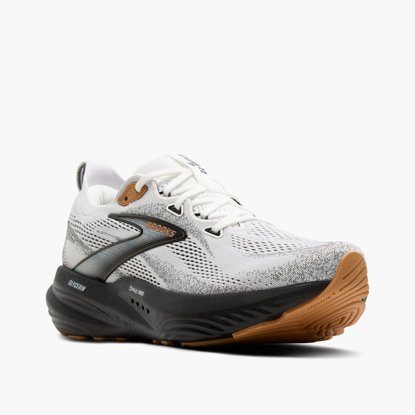 A grey and black ombre Brooks logo is in the middle of the upper on both sides.