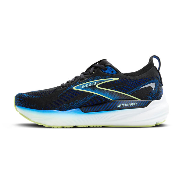 The ombre blue and black Brooks logo is outlined in green making it pop against the upper.