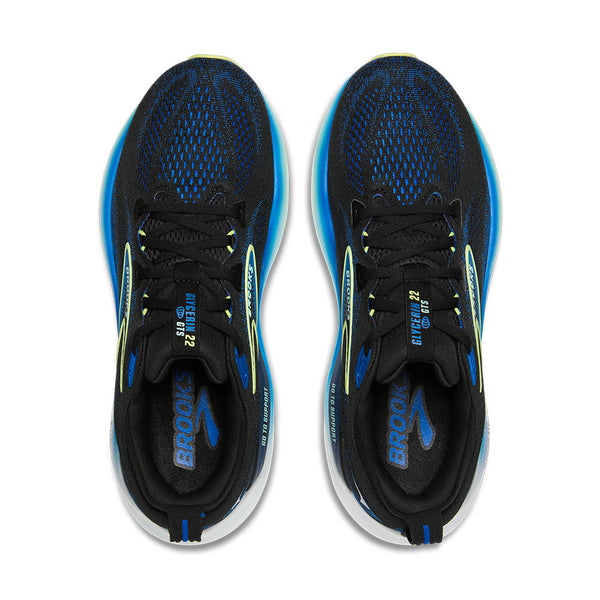 The top down view of this shoe shows black mesh covering a deep blue upper.
