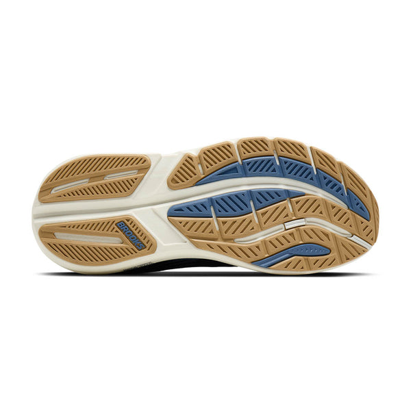 Close-up of a Brooks Ghost max 3
running shoe sole with brown and blue pattern.