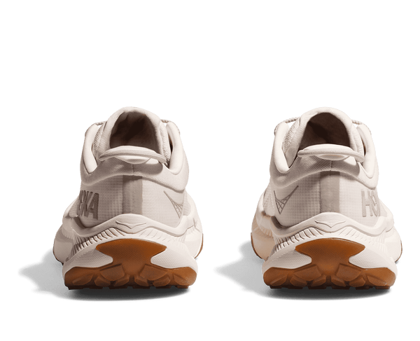 A small bit of the gum sole rubber comes just up the heel