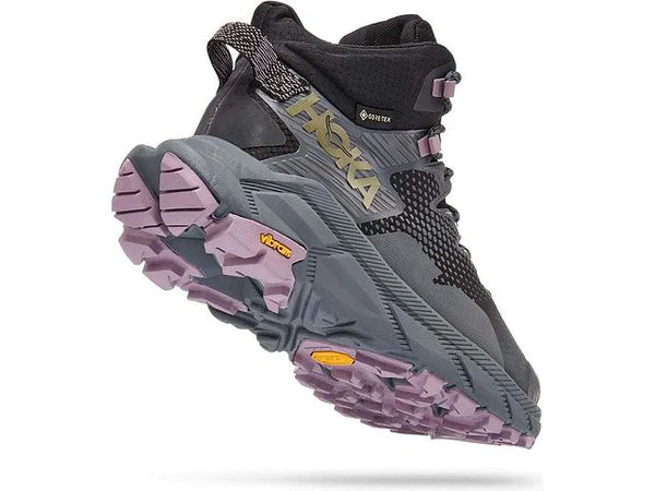 Back angle view of the Women's Trail Code GTX by HOKA in Black/Castlerock