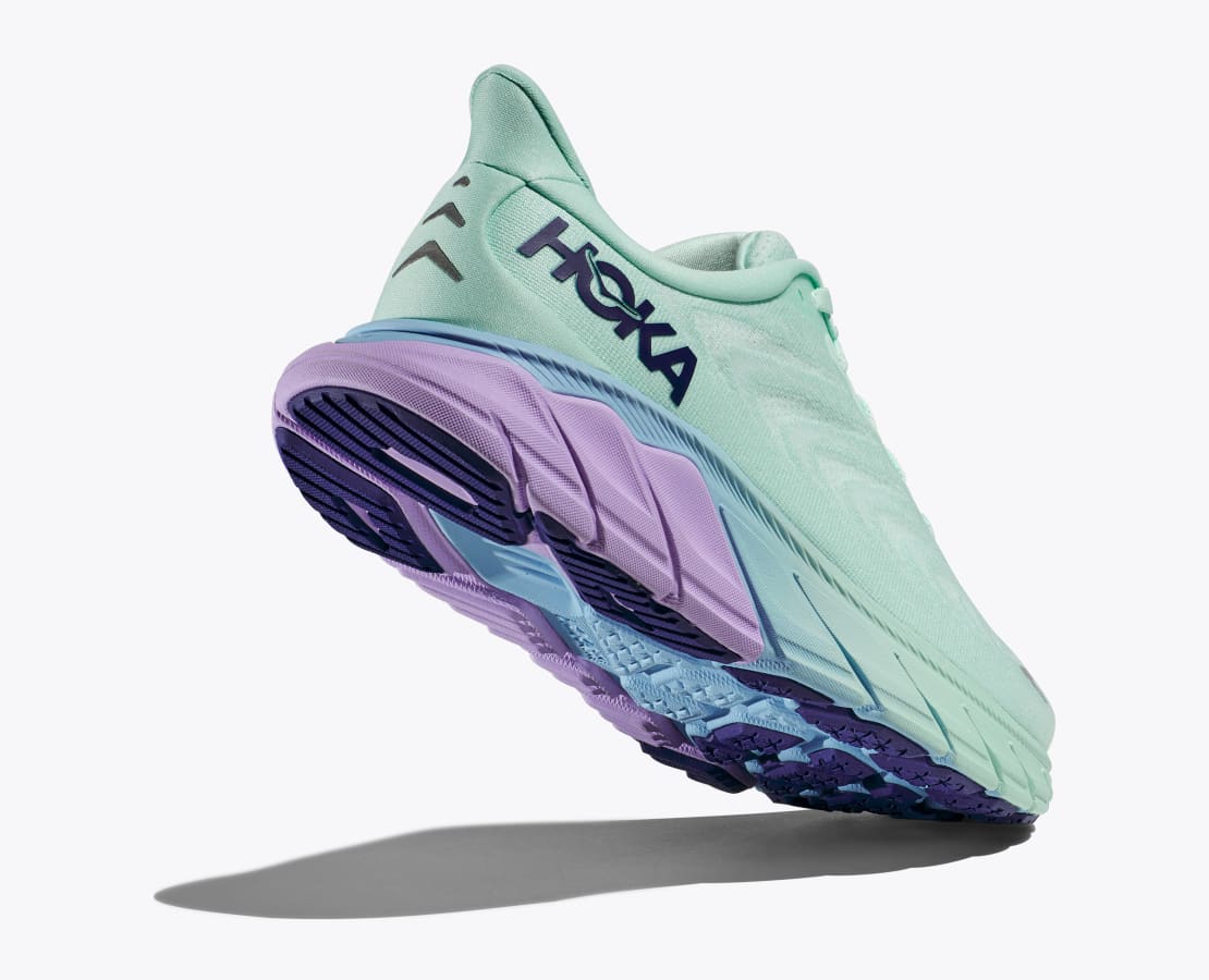 Back angle view of the Women's Arahi 6 wide D width, color Sunlit Ocean/Lilac Mist