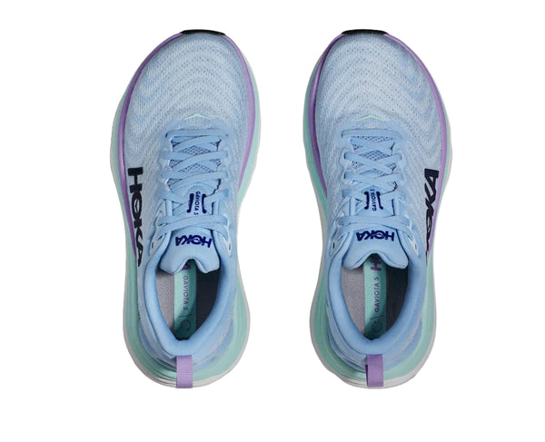 Hoka is stitched in the middle on the lateral side of the upper in deep blue thread.