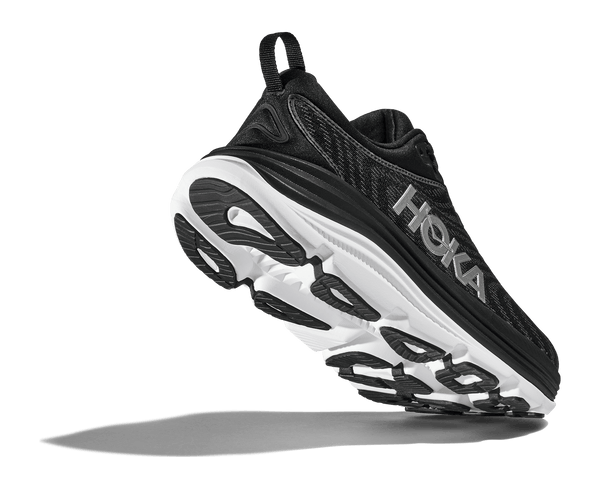 Black rubber is used on the outsole of the shoe to contrast the white midsole.