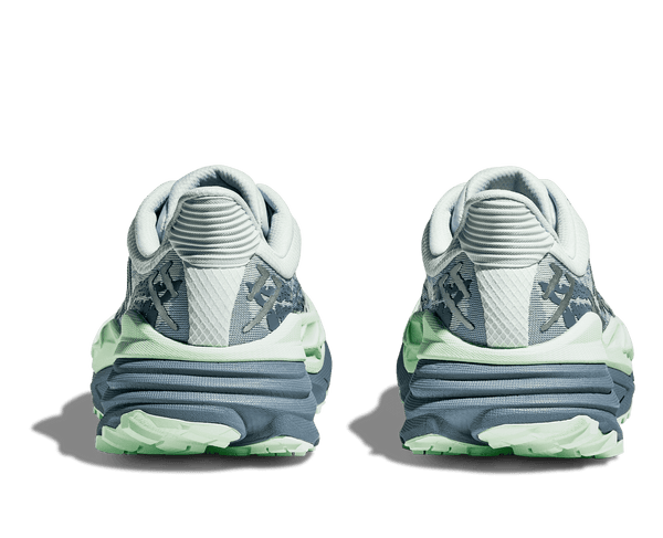 The heel cuff of this shoe is light blue.