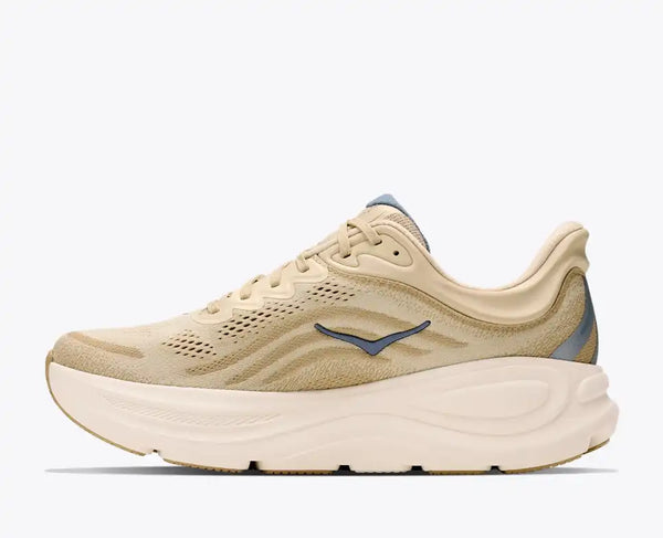 Cream and off-white running shoe on a white background