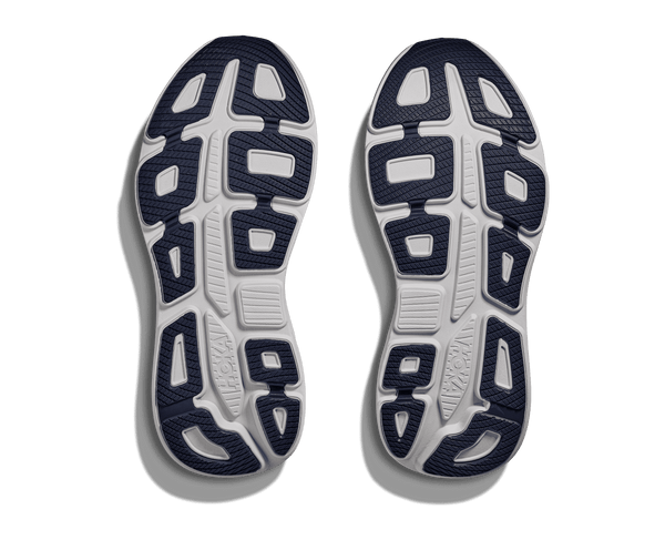 Navy blue rubber is used on the outsole of the shoe to contrast the white midsole.