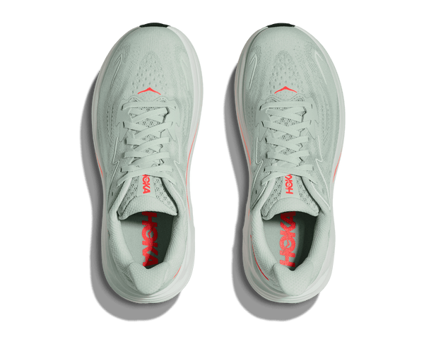 Pair of light gray sneakers with red accents on a transparent background