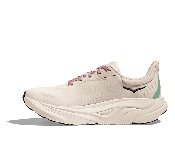 White running shoe with pink laces on a transparent background