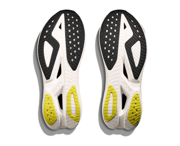 Black rubber is used on the outsole around the toe white neon yellow rubber is used near the heel.