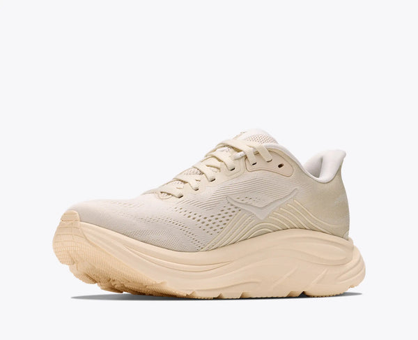 Beige running shoe on a white background
