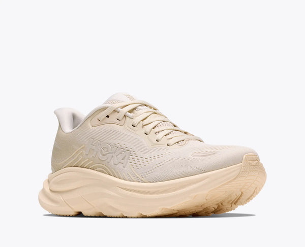 Beige running shoe on a white background