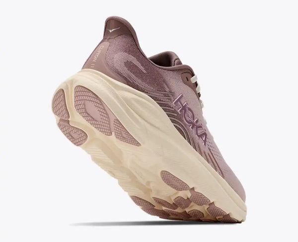 Light purple and mauve running shoe on a white background