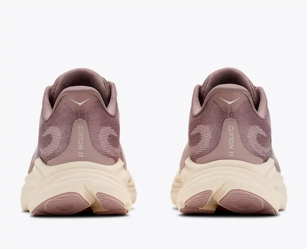 Light purple and mauve running shoe on a white background