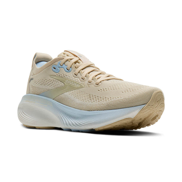 Beige running shoe with a white sole on a white background