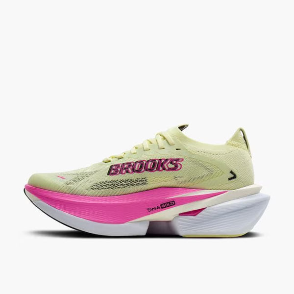 Light yellow and pink running shoe with 'Brooks' branding on a white background