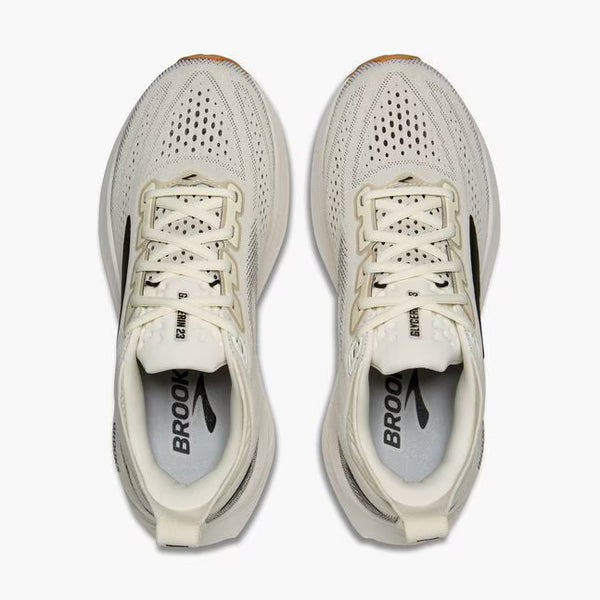 White running shoe with black accents on a white background