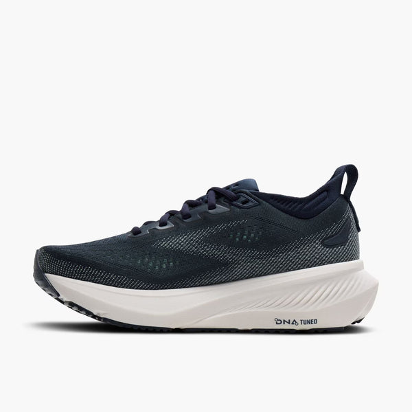 Navy running shoe on a white background
