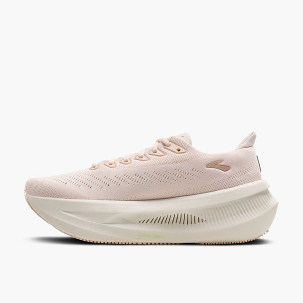A light pink knit athletic sneaker with a chunky, sculpted off-white sole, shown in a side profile on a clean white background.