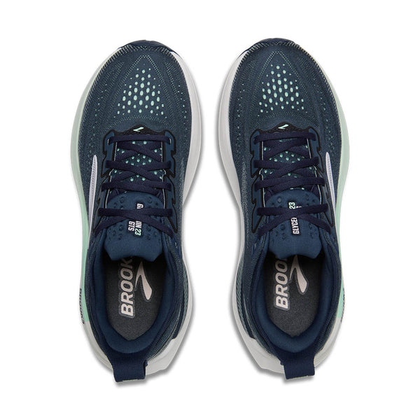 Pair of blue running shoes with 'Brooks' branding on a white background