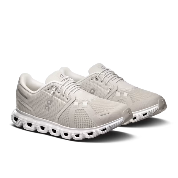 Pair of gray athletic shoes on a transparent background