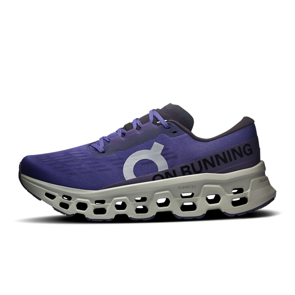 Purple running shoe with white sole on a white background