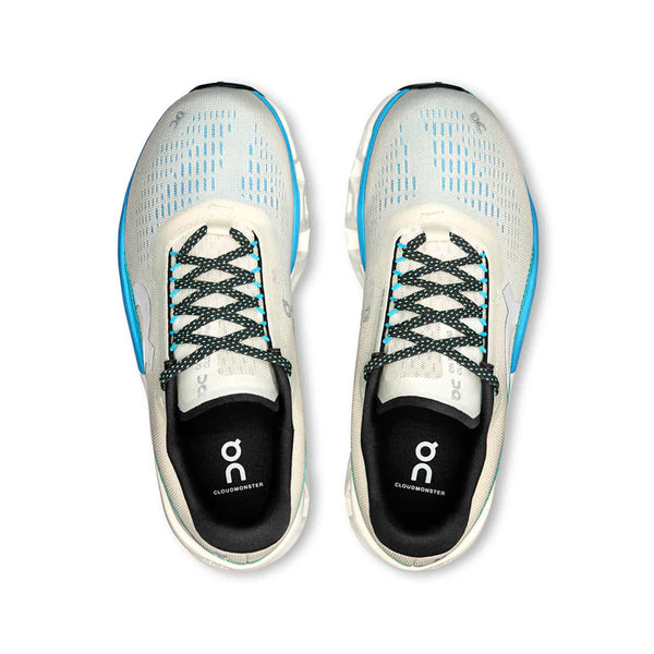 White On running shoes with blue accents on a white background.