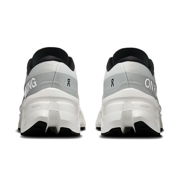 Back view of white running shoes with 'On' branding on a white background
