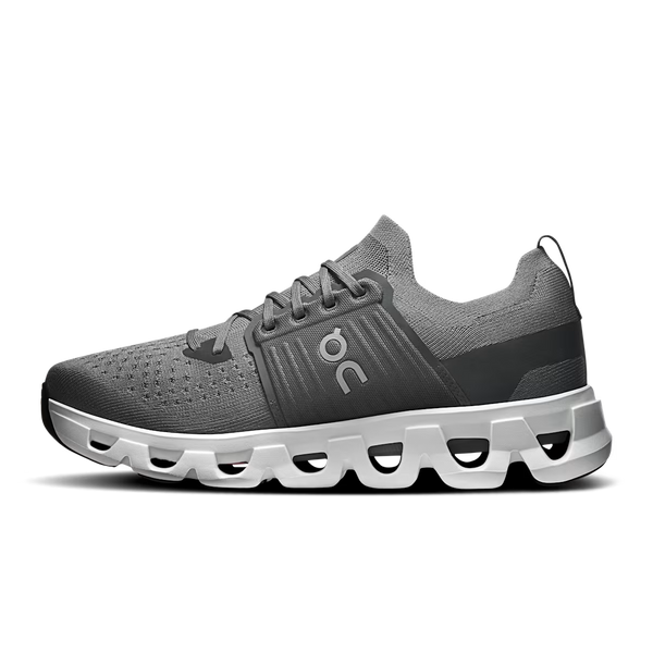 A gray On running shoe with a chunky white and gray CloudTec sole, shown on a white background.