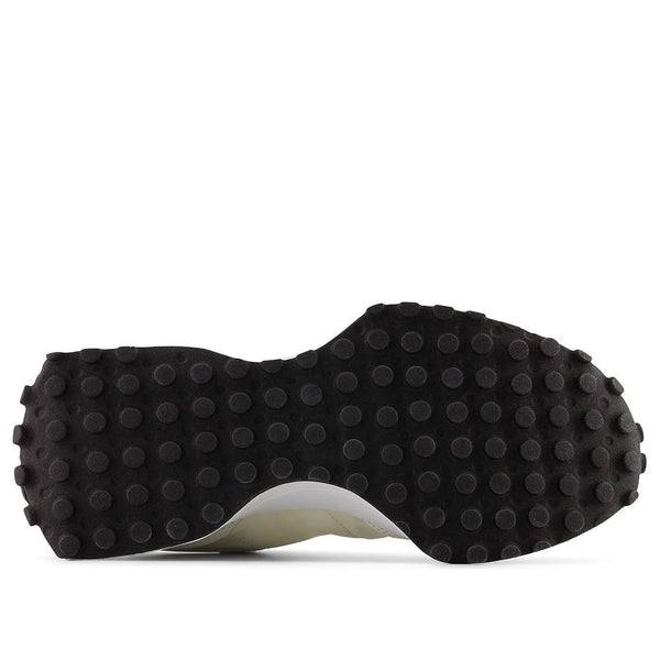 Beige sneaker with white sole on a white background