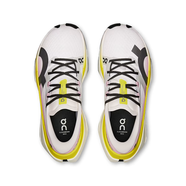 White running shoes with black and yellow accents on a white background