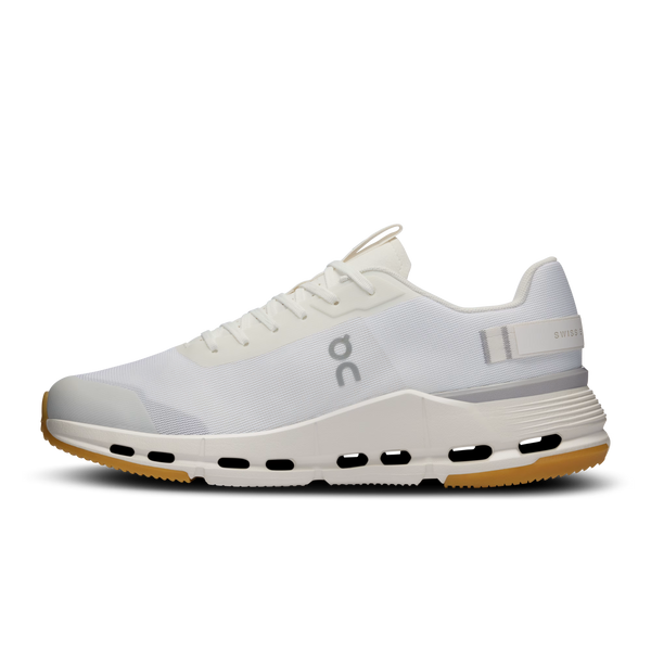 White athletic shoe with visible brand logo on a white background