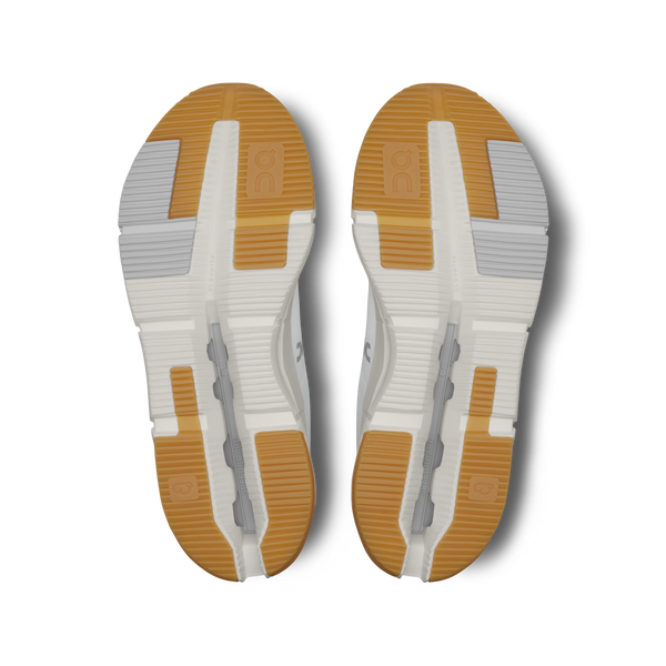 White athletic shoe with visible brand logo on a white background