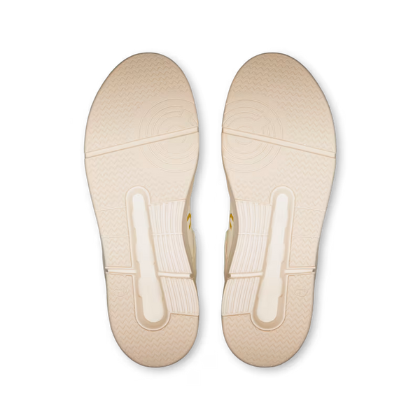 The outsole of these On lifestyle shoes ahve the same color scheme as the upper.