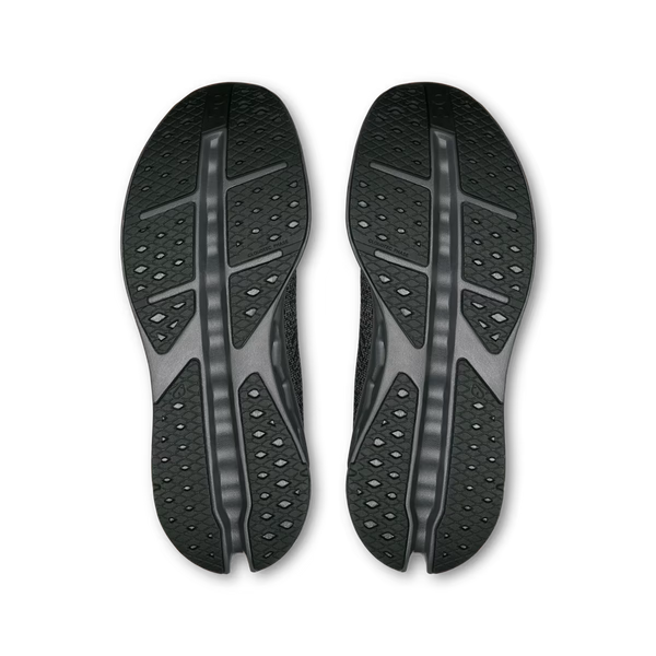 Black athletic shoe with a textured design on a white background